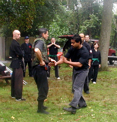 Modern Shinden Fudo Ryu training at Buyū Camp East in 'nature' (also known as in 'the pouring rain').